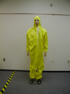 A man dressed in StayCool Waterproof disposable coveralls